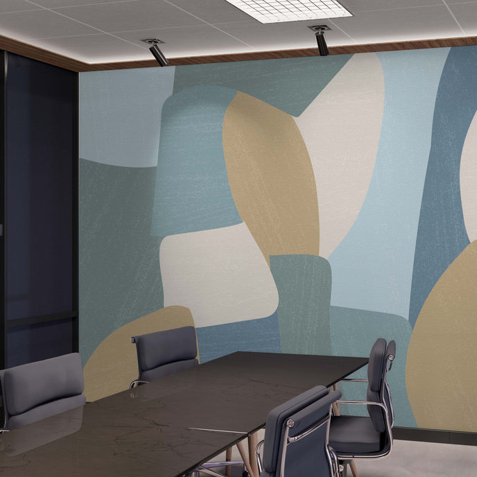 Shades of blues, yellow in abstract shapes with a paint brush texture. Blown up on wall in an office meeting room.