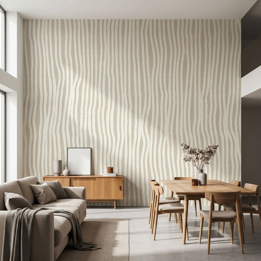 Large custom printed afrocentric geometric mural spilling across a spacious, well-lit living room wall with beige tones and stripe details.