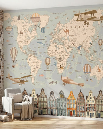 Close-up of the Aviator's Guide World Map mural with vivid colors and detailed printing on textured wall in a modern living room.
