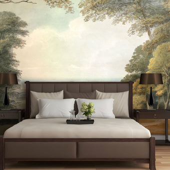 Watercolour landscape mural showing Windsor Castle in the distance, framed by woodland trees and open parkland in soft natural tones. On bedroom wall behind the bed. 
