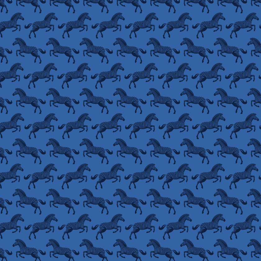 Repeating zebra wallpaper pattern featuring navy and royal blue zebras on a cobalt blue background.