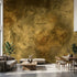 Close-up of the Golden Stone mural highlighting intricate abstract patterns and gold accents on textured concrete.