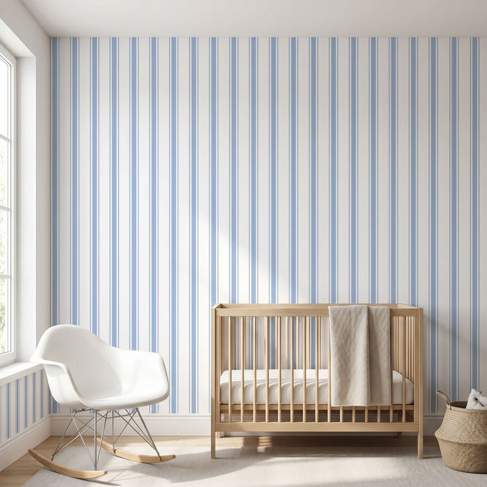 Interior scene with a Baby Blue seamless geometric mural covering the entire wall in a modern nursery space.