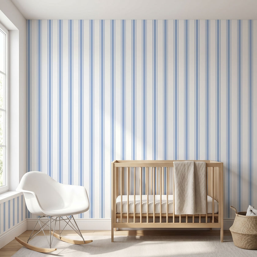 Interior scene with a Baby Blue seamless geometric mural covering the entire wall in a modern nursery space.