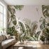 Vibrant floral and tropical wall mural in a modern living room setting, covering a large wall and enhancing the cozy interior.