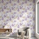 Full wall view of the Dandy mural in a minimalist living room, featuring vibrant purple floral pattern on a large wall space.