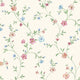 Delicate pink and blue floral wallpaper with trailing green stems and leaves on a warm cream background.