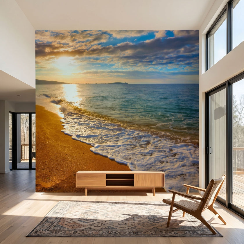 Realistic sunset beach mural filling an entire wall, highlighting ocean textures and vivid sunset colors in a living room.