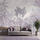Realistic jungle landscape mural with purple flowers and dense foliage, designed for full wall coverage in natural lighting.