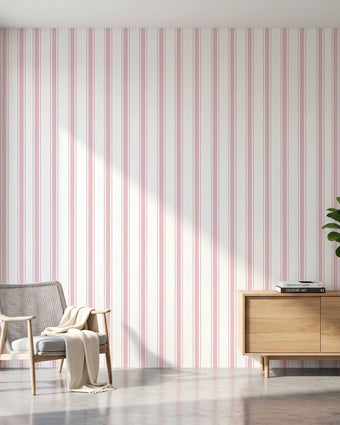 Pink seamless geometric stripe mural covering entire modern living room wall, emphasizing pattern continuity and wall size.