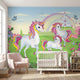 Vibrant nursery mural featuring a rainbow and whimsical unicorn designed for children's decor.