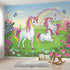 Realistic scene of a rainbow and unicorn mural on nursery wall, captured from a side angle for depth.