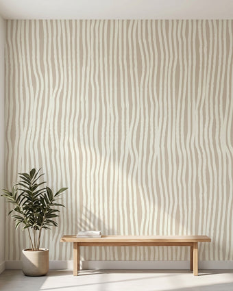 Seamless African-inspired geometric mural covering the entire wall in a modern interior with natural lighting and muted beige colors.