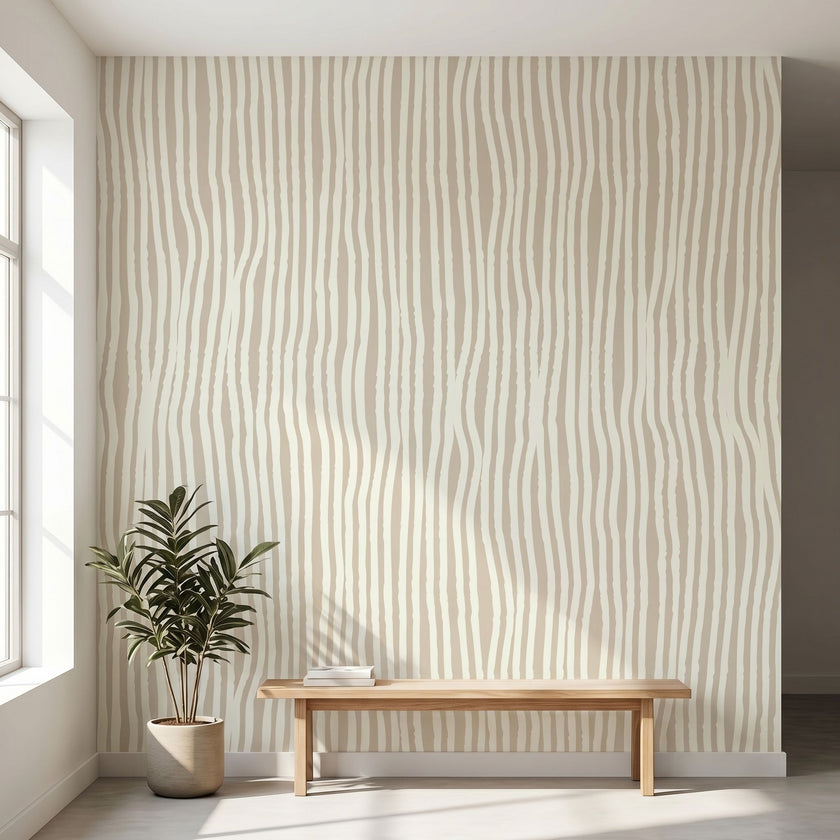 Seamless African-inspired geometric mural covering the entire wall in a modern interior with natural lighting and muted beige colors.