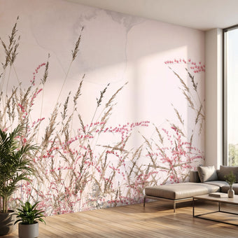 Full view of a pink floral mural covering an entire wall in a modern indoor space, illuminated by warm diffused sunlight.