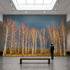 Spacious gallery scene showing the full Golden Birch mural on a wall with balanced lighting and realistic detail.