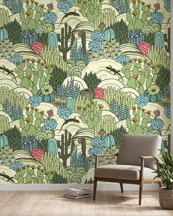 Seamless Hello Aloe mural on a modern living room wall with vibrant green cactus and floral pattern, softly lit by natural light.