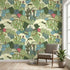 Seamless Hello Aloe mural on a modern living room wall with vibrant green cactus and floral pattern, softly lit by natural light.