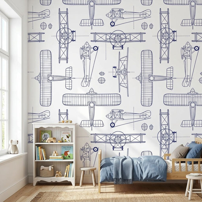 Kids' room with a white seamless mural featuring subtle plane patterns, illuminated by natural daylight, creating a balanced and vibrant space.
