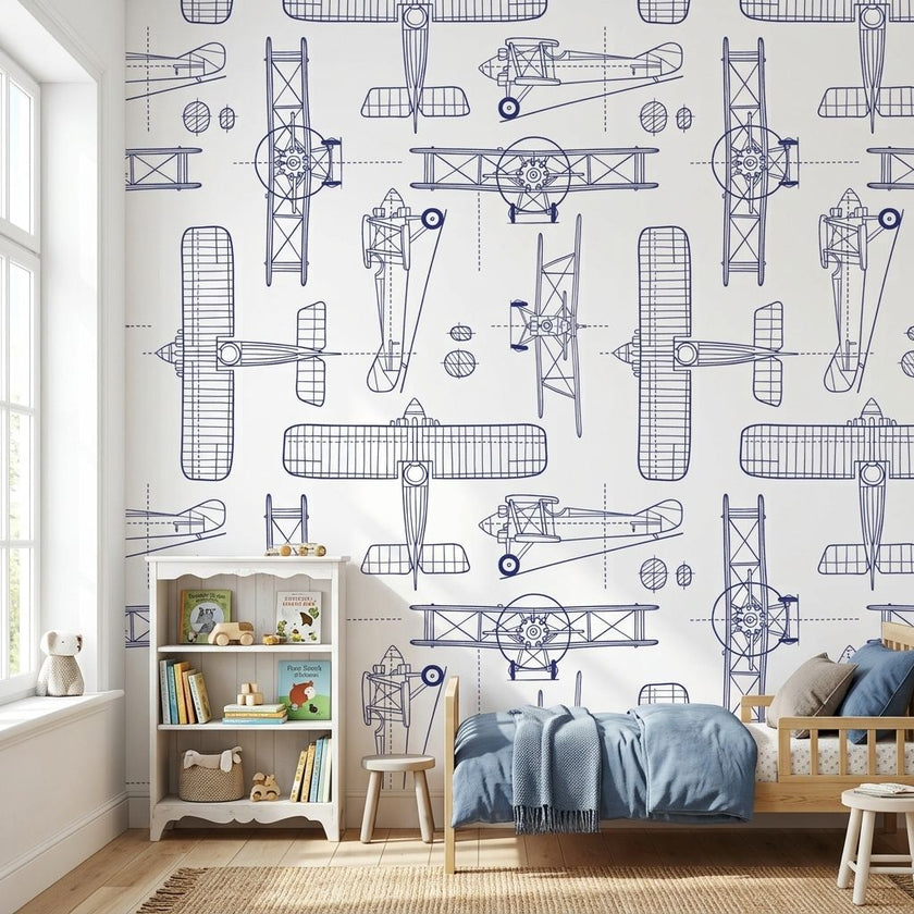 Kids' room with a white seamless mural featuring subtle plane patterns, illuminated by natural daylight, creating a balanced and vibrant space.
