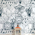 Entire wall African-themed mural with seamless elephants, giraffes, and zebras, filling a modern interior with vibrant colors and detail.