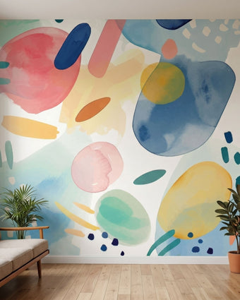Cinematic shot of a large teal watercolour mural dominating a modern room wall.