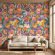 Dramatic mural of multicoloured playful pansies covering an entire wall in a lively interior setting.