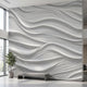 Large wall mural with seamless grey and white geometric pattern in a minimalistic modern interior, covering the entire wall.