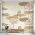 Large floral watercolour mural of lotus flowers covering an entire wall, showcasing vibrant pinks and multicoloured hues in realistic detail.
