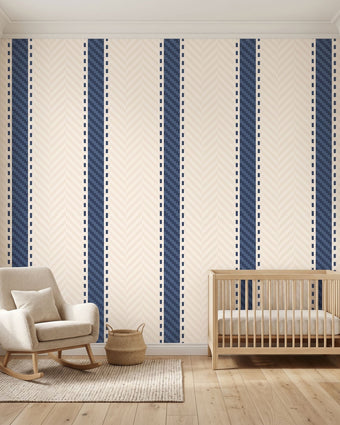 Large mural with seamless geometric stripe pattern in beige and blue, filling a wall in a modern, stylish interior with natural sunlight.