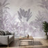 Full-wall mural in modern interior featuring dense tropical forest with purple flowers and cascading leaves.