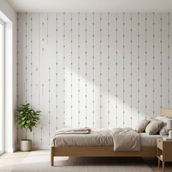 Vibrant blue tulip wall mural with seamless pattern covering an entire interior wall in a modern space.