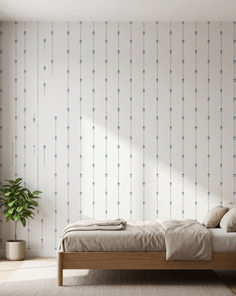 Vibrant blue tulip wall mural with seamless pattern covering an entire interior wall in a modern space.