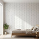 Vibrant blue tulip wall mural with seamless pattern covering an entire interior wall in a modern space.