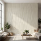 Sleek interior featuring a large, seamless wall mural with African geometric motifs, filling the space completely with beige and stripe accents.