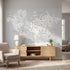 Medium shot of 'The World's a Zoo' mural in a modern living room, focused on bright animal illustrations.