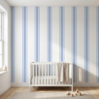 Seamless Baby Blue geometric mural filling an entire wall in a modern nursery with soft natural lighting.