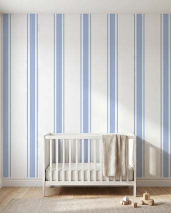 Seamless Baby Blue geometric mural filling an entire wall in a modern nursery with soft natural lighting.