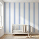 Seamless Baby Blue geometric mural filling an entire wall in a modern nursery with soft natural lighting.