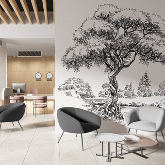 Black and white illustrated mural of a large tree beside a calm river in a peaceful countryside landscape. On a wall in an office seating room. 