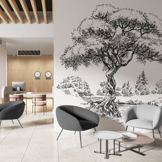 Black and white illustrated mural of a large tree beside a calm river in a peaceful countryside landscape. On a wall in an office seating room. 