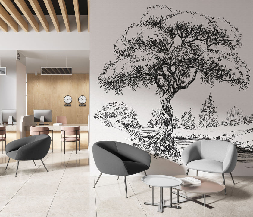 Black and white illustrated mural of a large tree beside a calm river in a peaceful countryside landscape. On a wall in an office seating room. 