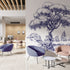 Navy illustrated mural of a large tree beside a calm river in a peaceful countryside landscape. On an office waiting room wall. 