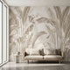 Vibrant overgrown Stralizias floral and butterfly mural covering a large wall in a modern interior with lush greenery and natural daylight.
