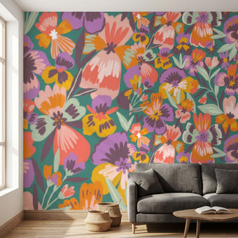Vibrant wall mural of playful pansies filling a large wall in a modern interior with natural light.