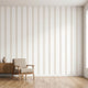 Studio-style wall mural with seamless beige stripe pattern filling the wall, evenly illuminated in a contemporary interior.