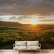 Interior with a seamless mountain sunset mural that fully covers the wall, highlighting detailed textures and vibrant colors.