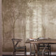 Sepia Foggy Forest mural featuring softly layered woodland trees and foliage in warm taupe and sepia tones, creating a misty, atmospheric forest scene with a vintage textured finish. On a wall in a dinning room with dark walnut wood furniture. 