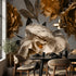Portrait of the mural in a stylish dining space highlighting black and gold floral motifs.