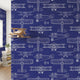Close-up of the Taking Off - Blue mural with intricate seamless pattern in navy and blue, displayed on a matte wall with soft natural light.